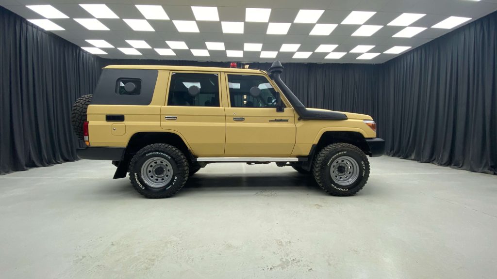 Side profile of armored Toyota SUV