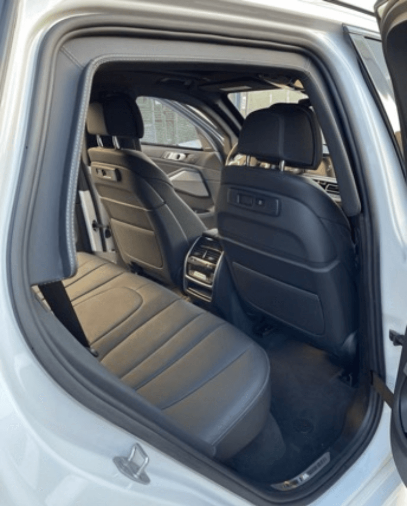 Back passenger side interior shot of armored BMW X5