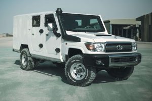 White armored toyota truck