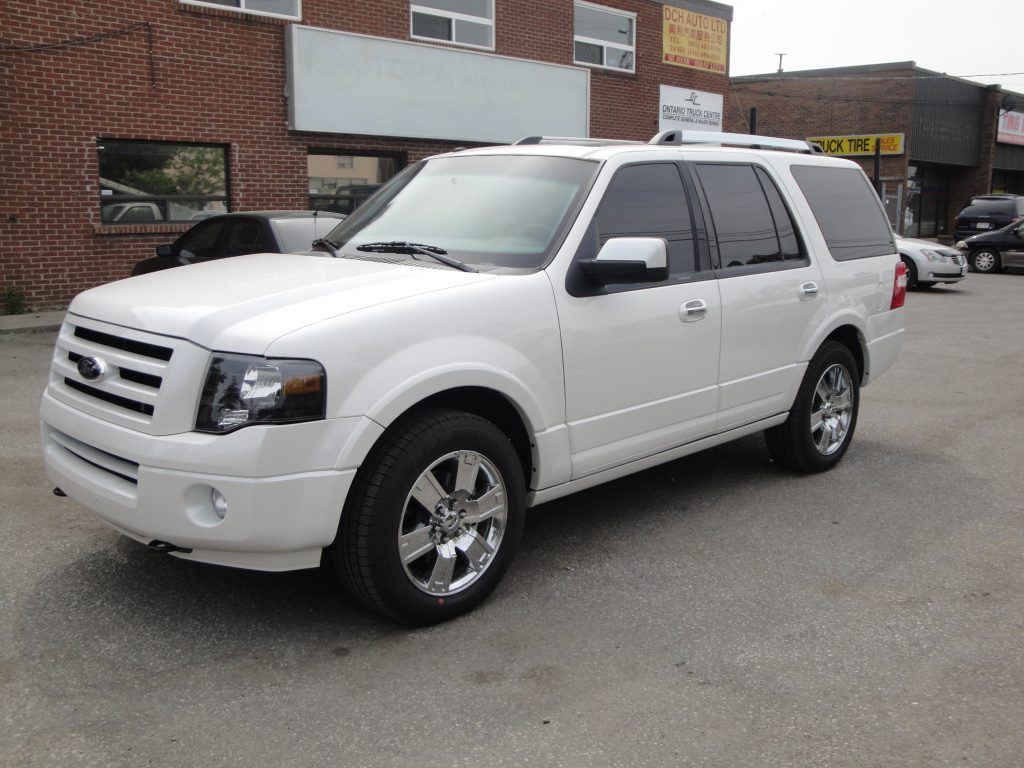 TAG White armored Ford Expedition SUV passenger vehicle picture