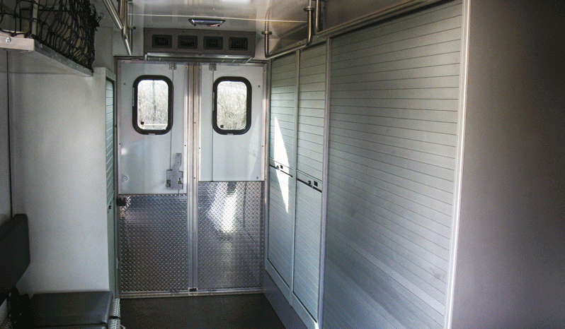 TAG Interior of non-armored Dodge law enforcement equipment truck