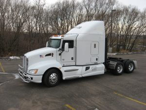 Armored Kenworth 10 Wheeler White Parking Lot