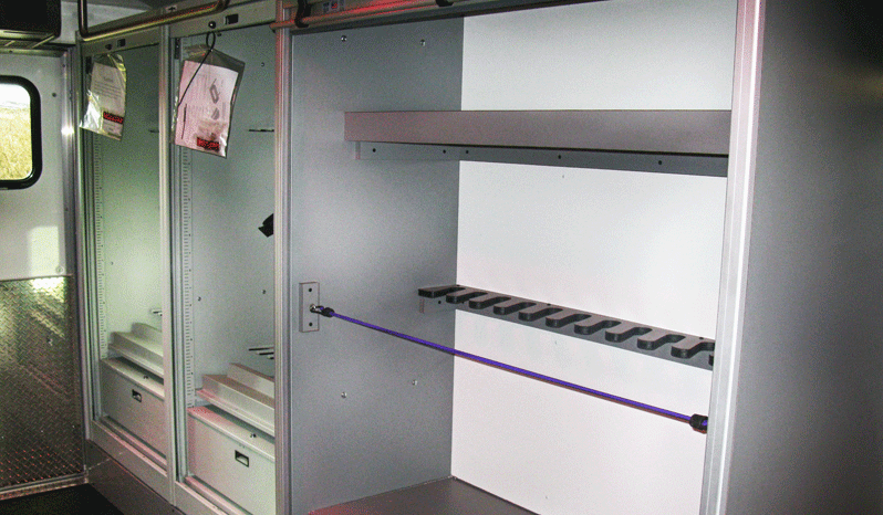 TAG Interior view of storage in non-armored Ford RDV F-650 law enforcement vehicle