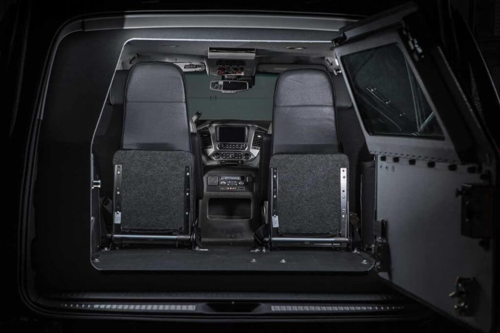 TAG Armored Tactical SWAT Suburban Interior of bulletproof Chevrolet Tactical Suburban 3500LT with fold-up seats.