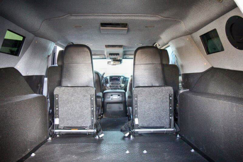 TAG Armored Tactical SWAT Suburban Rear Interior View Seats Folded