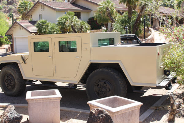 TAG Armored Hummer Side Rear Corner View Outdoors